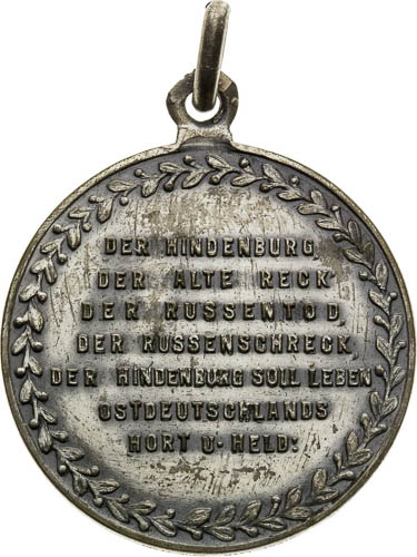 Medal with eyelet - back